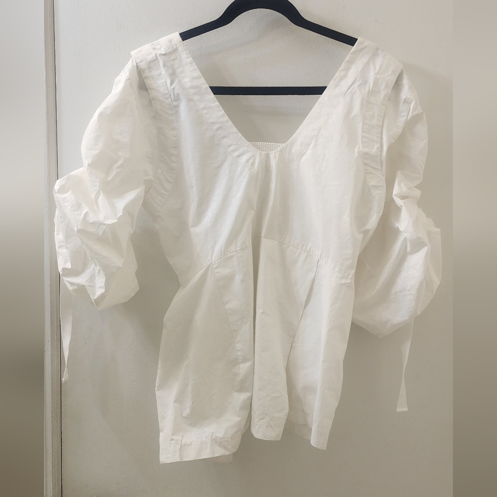 Toga Achieves Elegant White Women's Top, Size 38.